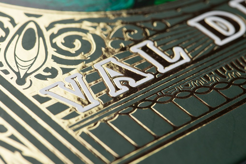 Beautiful gold hot foil stamping on a green hardcover art book.