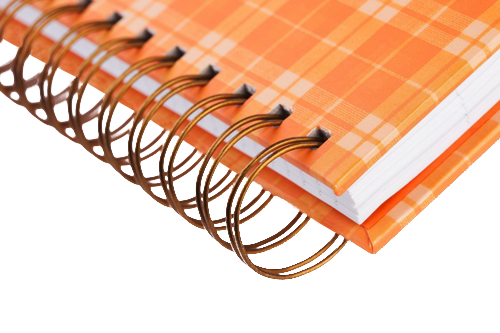 Spiral binding on a plaid notebook