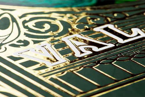 Beautiful gold hot foil stamping on a green hardcover art book.